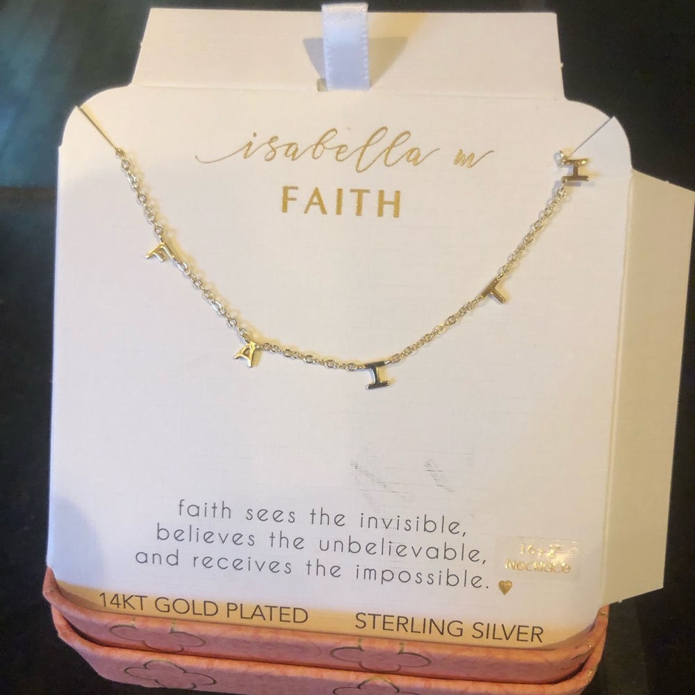 Beautiful necklace says FAITH 14KG